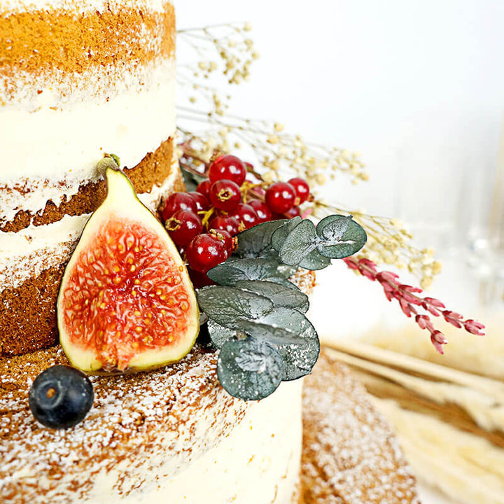 Gedroogde bloemen taartdecoratie met Eucalyptus, gipskruid en roze Lavendel